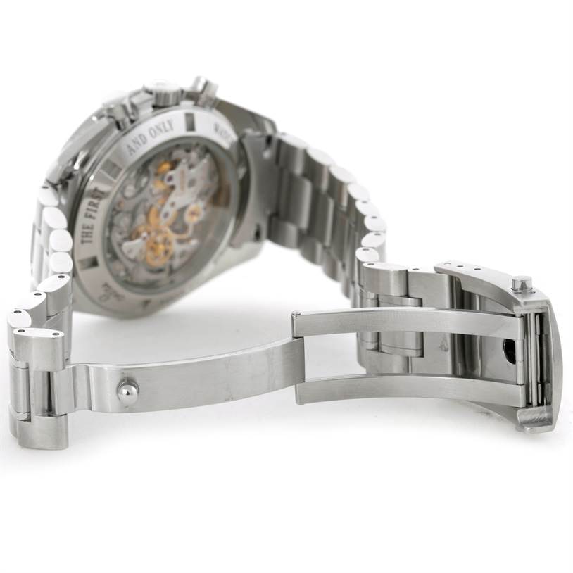 This is an angled view of the Omega Speedmaster 3573.50.00 Men
s Stainless Steel Black Dial 3573.50.00 Men
s Stainless Steel Black Dial
s open stainless steel clasp and exhibition case back.