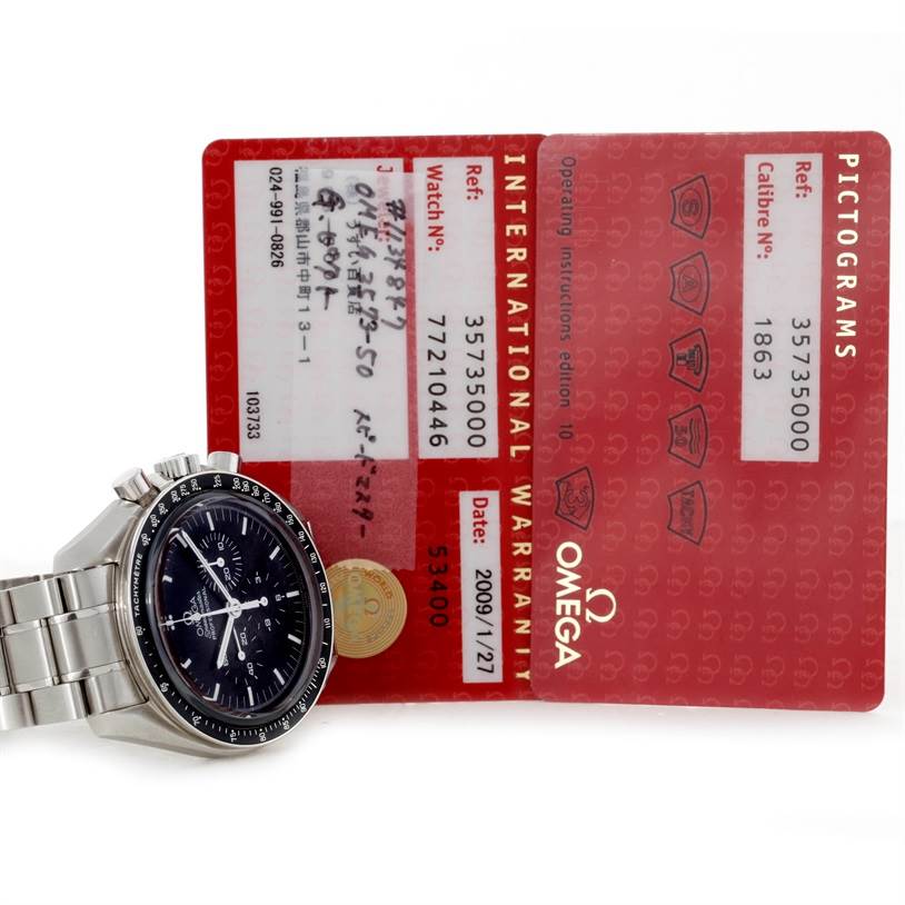 The Omega Speedmaster 3573.50.00 Men
s Stainless Steel Black Dial 3573.50.00 Men
s Stainless Steel Black Dial watch is pictured from a left-side angle along with its warranty and pictograms cards.