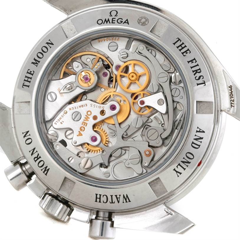 The image shows the exposed movement and intricate inner workings of the Omega Speedmaster 3573.50.00 Men
s Stainless Steel Black Dial 3573.50.00 Men
s Stainless Steel Black Dial
s mechanical back.