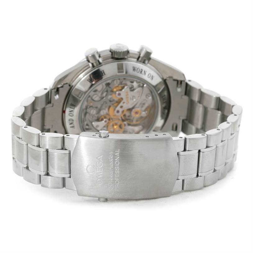 The image shows the back and bracelet of the Omega Speedmaster 3573.50.00 Men
s Stainless Steel Black Dial 3573.50.00 Men
s Stainless Steel Black Dial watch, highlighting its transparent case back and stainless steel links.