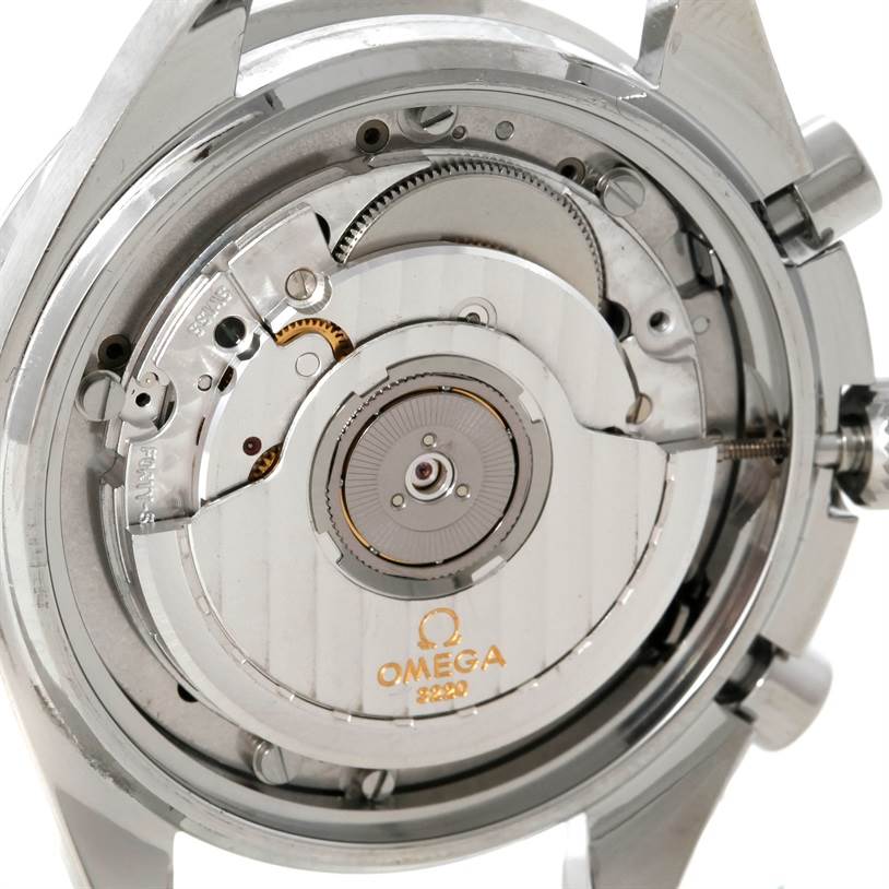 The image shows a close-up of the movement inside the case back of an Omega Speedmaster 3510.50.00 Men
s Stainless Steel Black Dial 3510.50.00 Men
s Stainless Steel Black Dial watch.