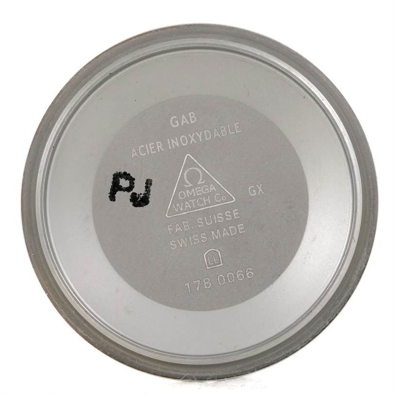 This image shows the underside of the case back cover for an Omega Speedmaster 323.30.40.40.06.001 Men's Stainless Steel Grey Dial 323.30.40.40.06.001 Men's Stainless Steel Grey Dial watch.