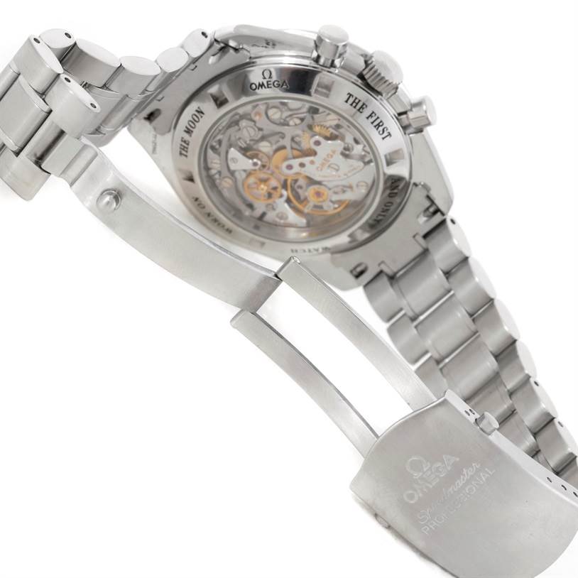 The image shows the back case and metal bracelet of an Omega Speedmaster 3576.50.00 Men
s Stainless Steel Black Dial 3576.50.00 Men
s Stainless Steel Black Dial, with the clasp open, revealing internal mechanisms.