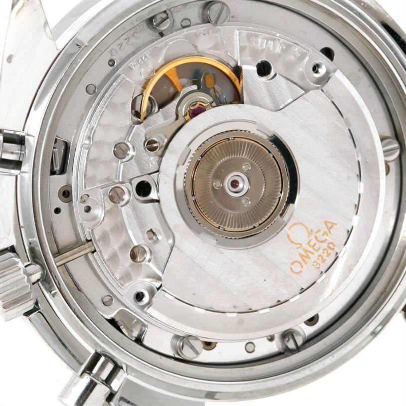 This image shows the close-up view of the Omega Speedmaster 3510.50.00 Men's Stainless Steel Black Dial 3510.50.00 Men's Stainless Steel Black Dial watch's movement and inner mechanics.