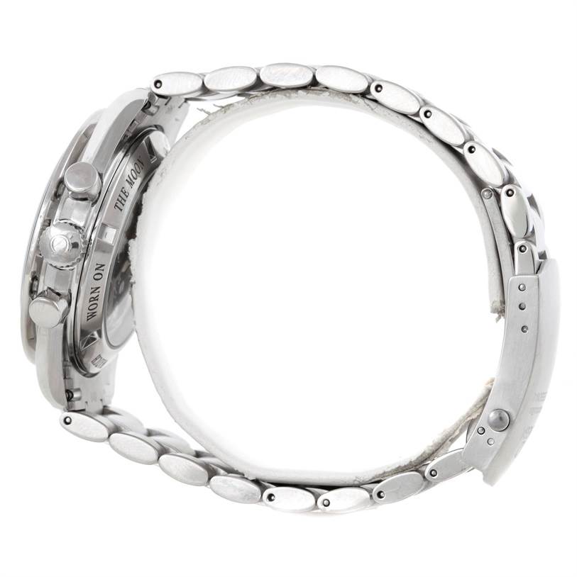 The image shows a side profile of an Omega Speedmaster 3573.50.00 Men
s Stainless Steel Black Dial 3573.50.00 Men
s Stainless Steel Black Dial watch, highlighting the bracelet, clasp, and pushers.