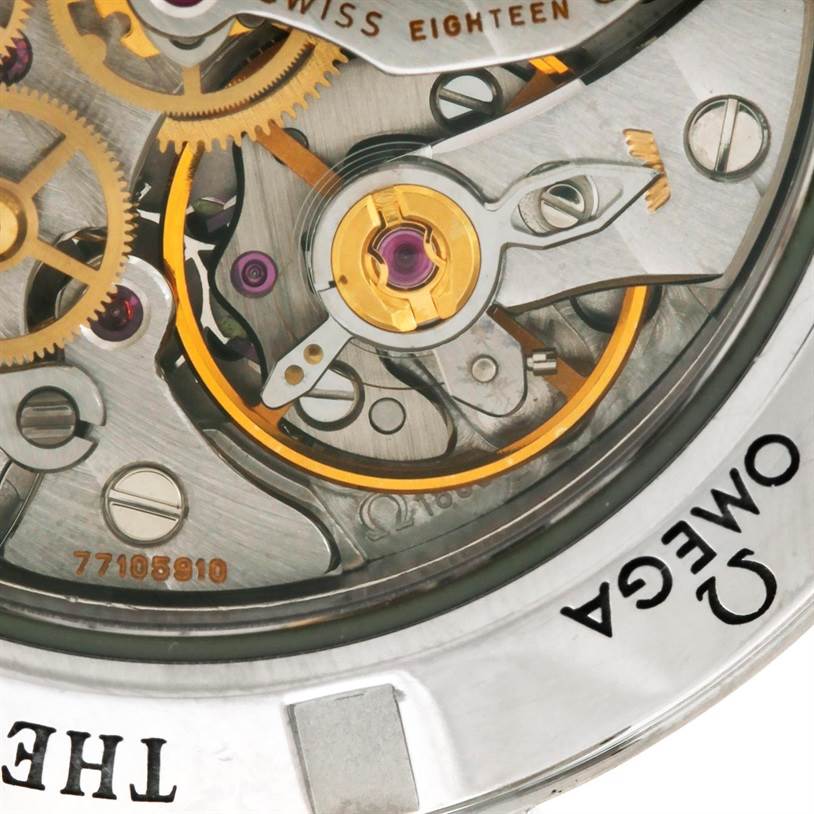 The image shows a close-up of the movement mechanism of the Omega Speedmaster 3573.50.00 Men
s Stainless Steel Black Dial 3573.50.00 Men
s Stainless Steel Black Dial watch.