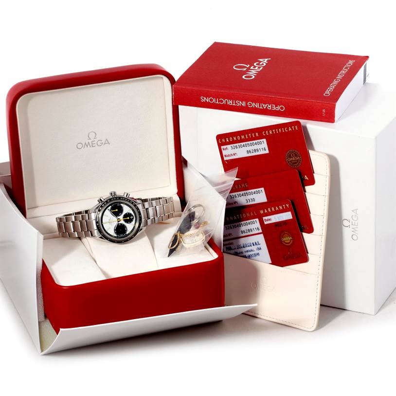 The Omega Speedmaster 326.30.40.50.04.001 Men
s Stainless Steel White Dial 326.30.40.50.04.001 Men
s Stainless Steel White Dial watch is displayed inside its box along with instructional books, warranty cards, and a tag.