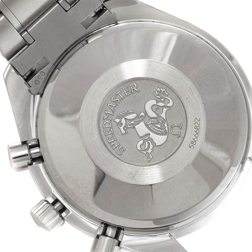 This image shows the back case of an Omega Speedmaster 3513.50.00 Men's Stainless Steel Black Dial 3513.50.00 Men's Stainless Steel Black Dial watch, highlighting its engraved logo and serial number.