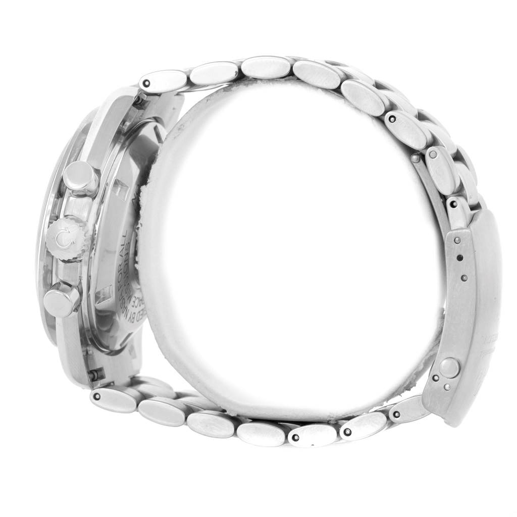 The image shows a side view of the Omega Speedmaster 3575.20.00 Men
s Stainless Steel White Dial 3575.20.00 Men
s Stainless Steel White Dial
s case, pushers, crown, and metal bracelet.