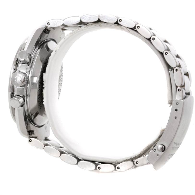 The image shows a side view of the Omega Speedmaster 3570.50.00 Men
s Stainless Steel Black Dial 3570.50.00 Men
s Stainless Steel Black Dial watch, highlighting the bracelet, case, and pushers.