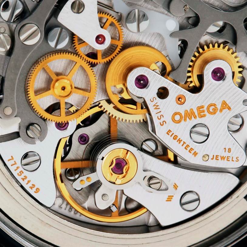 This image shows the intricate internal gears and mechanisms of the Omega Speedmaster 3570.50.00 Men
s Stainless Steel Black Dial 3570.50.00 Men
s Stainless Steel Black Dial watch movement.