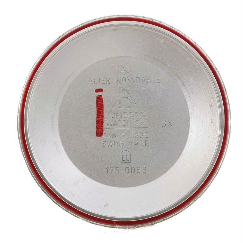 This image shows the inside of the case back of an Omega Speedmaster 3513.50.00 Men
s Stainless Steel Black Dial 3513.50.00 Men
s Stainless Steel Black Dial watch, viewed from a direct top-down angle.