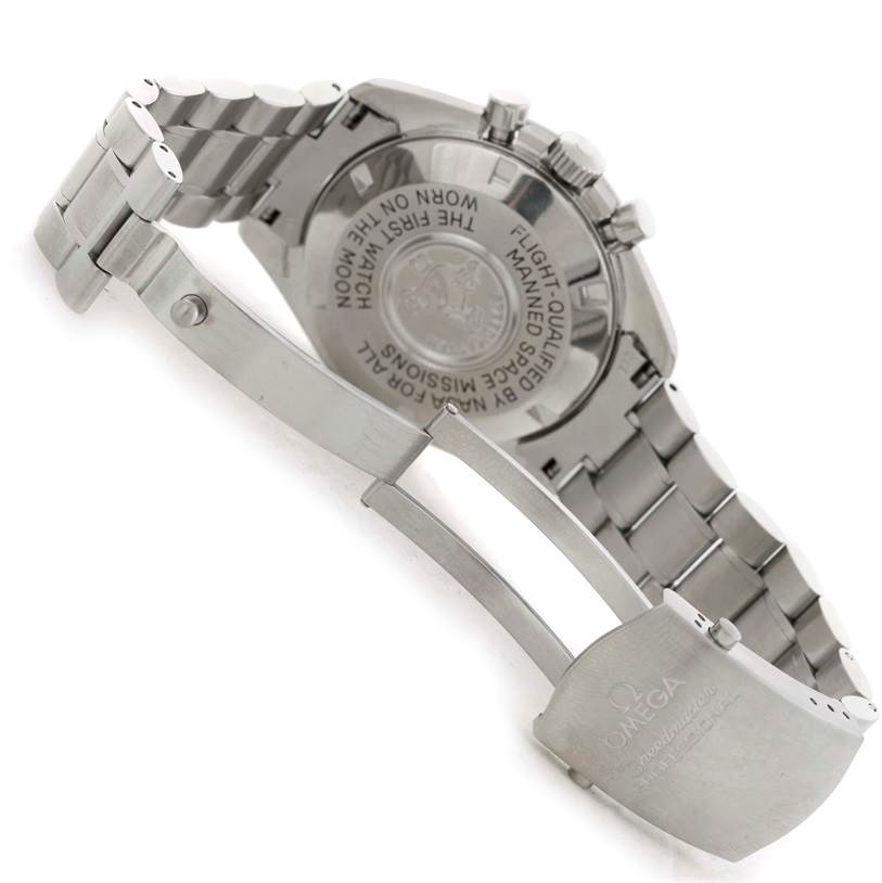 The image shows the back and clasp of an Omega Speedmaster 3570.50.00 Men
s Stainless Steel Black Dial 3570.50.00 Men
s Stainless Steel Black Dial watch, highlighting its stainless steel bracelet and engraved case back.