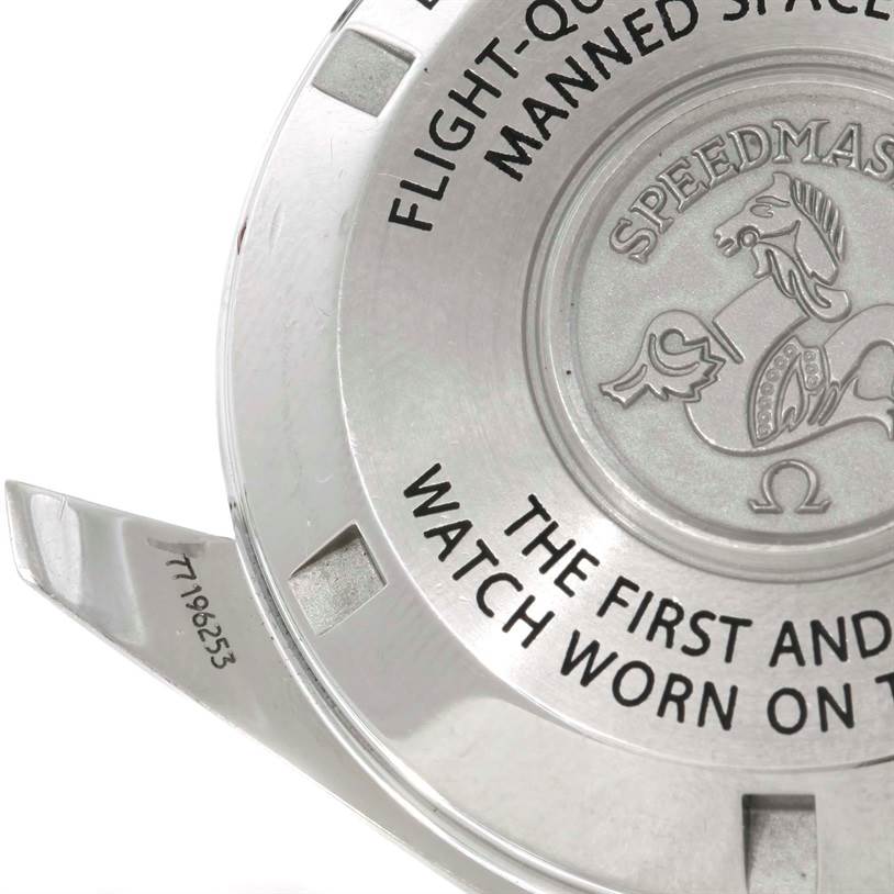 The image shows the case back of an Omega Speedmaster 311.30.42.30.01.001 Men
s Stainless Steel Black Dial 311.30.42.30.01.001 Men
s Stainless Steel Black Dial watch, highlighting the engraved emblem and text.