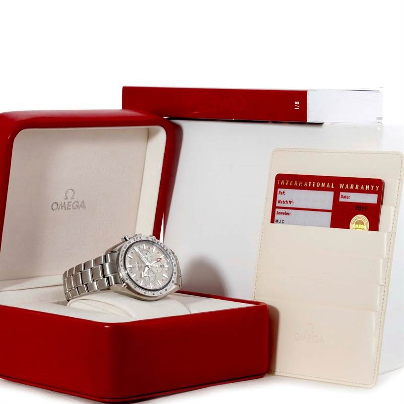 The image shows an Omega Speedmaster 3581.30.00 Men
s Stainless Steel White Dial 3581.30.00 Men
s Stainless Steel White Dial watch in its box with an international warranty card beside it.