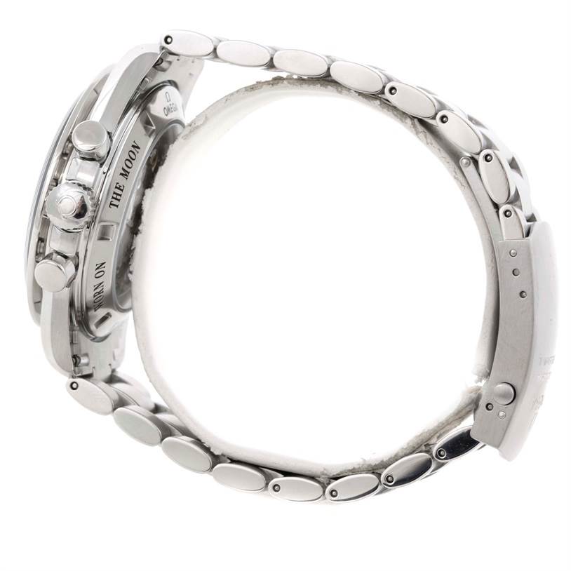 The image shows a side view of the Omega Speedmaster 3573.50.00 Men
s Stainless Steel Black Dial 3573.50.00 Men
s Stainless Steel Black Dial watch, highlighting the case, pushers, crown, and metal bracelet.