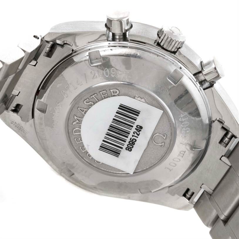 The image shows the back case and part of the bracelet of the Omega Speedmaster 323.30.40.40.02.001 Men
s Stainless Steel White Dial 323.30.40.40.02.001 Men
s Stainless Steel White Dial watch.