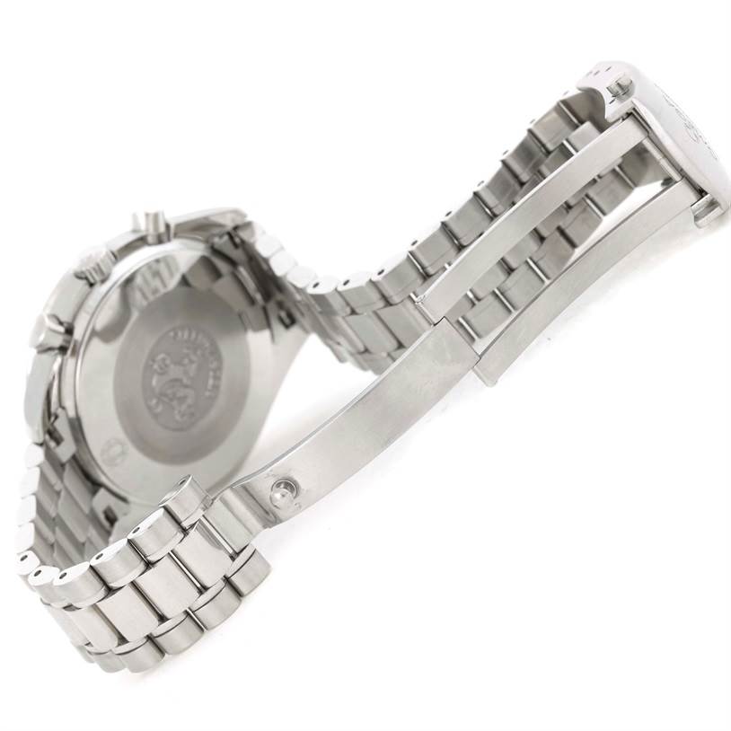 The image shows the back casing and partially open metal bracelet of an Omega Speedmaster 3539.50.00 Men
s Stainless Steel Black Dial 3539.50.00 Men
s Stainless Steel Black Dial watch.