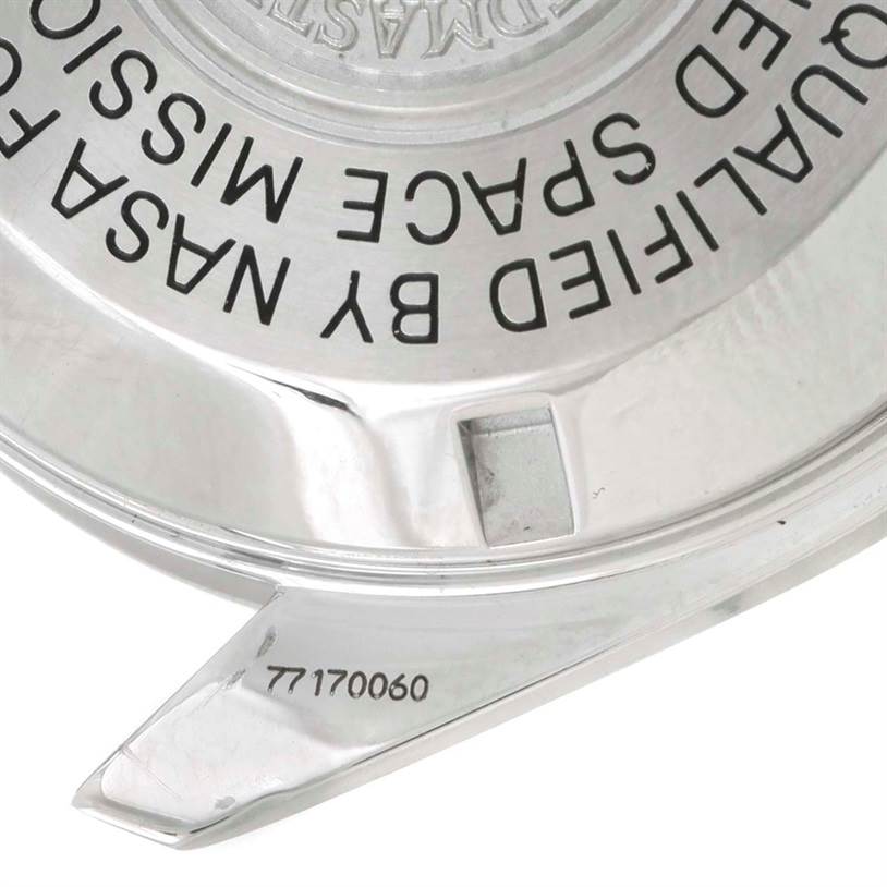 This image shows the back case of an Omega Speedmaster 3570.50.00 Men
s Stainless Steel Black Dial 3570.50.00 Men
s Stainless Steel Black Dial watch, highlighting the engraving and serial number.