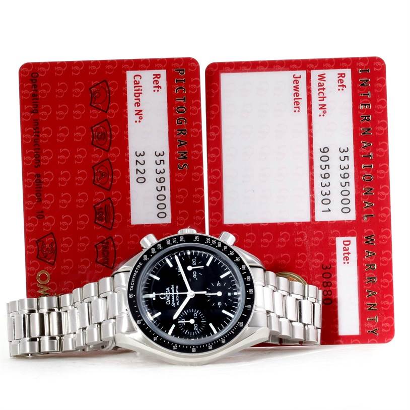 The image shows an Omega Speedmaster 3539.50.00 Men
s Stainless Steel Black Dial 3539.50.00 Men
s Stainless Steel Black Dial watch at a slight upward angle, alongside its warranty cards.