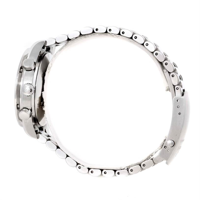 The image shows a side view of an Omega Speedmaster 3539.50.00 Men
s Stainless Steel Black Dial 3539.50.00 Men
s Stainless Steel Black Dial watch, highlighting the bracelet, case, and pushers.