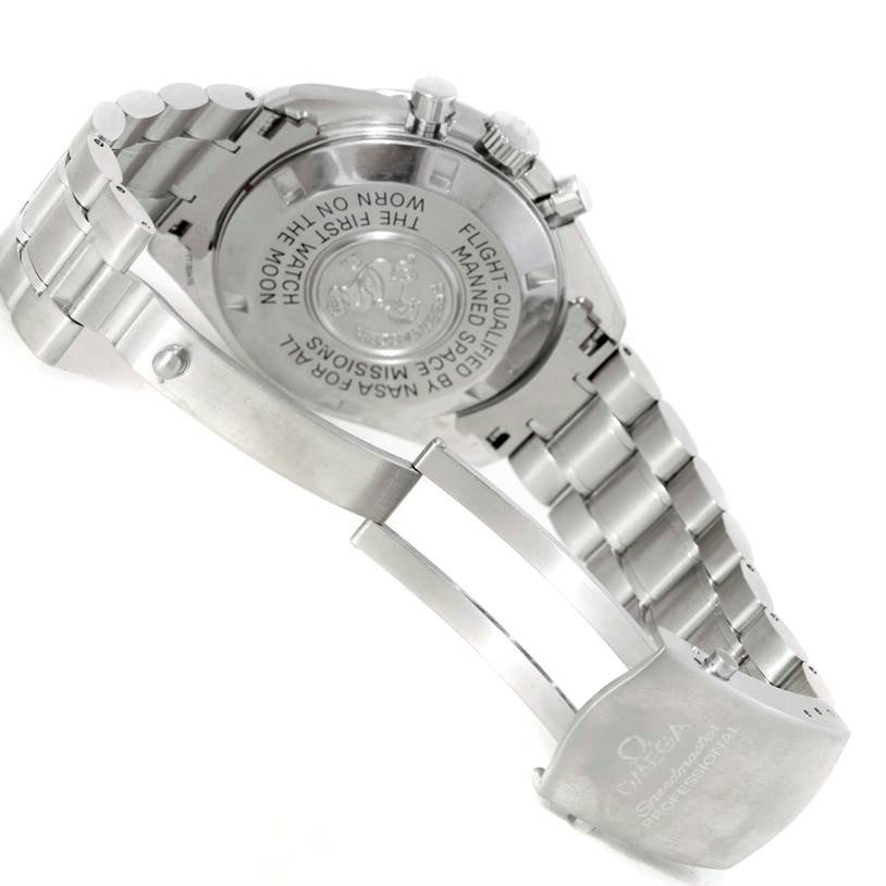 The image shows the back and bracelet of an Omega Speedmaster 3570.50.00 Men
s Stainless Steel Black Dial 3570.50.00 Men
s Stainless Steel Black Dial watch, displaying the engraved case back and the clasp.