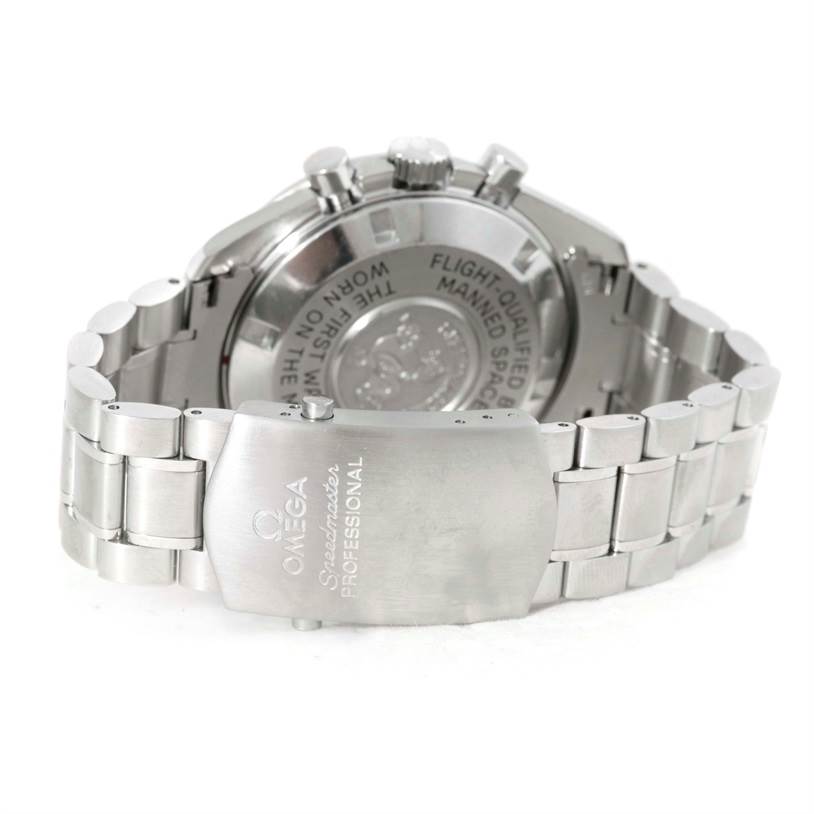 The image shows the rear view of an Omega Speedmaster 3570.50.00 Men
s Stainless Steel Black Dial 3570.50.00 Men
s Stainless Steel Black Dial watch, focusing on the clasp and case back.