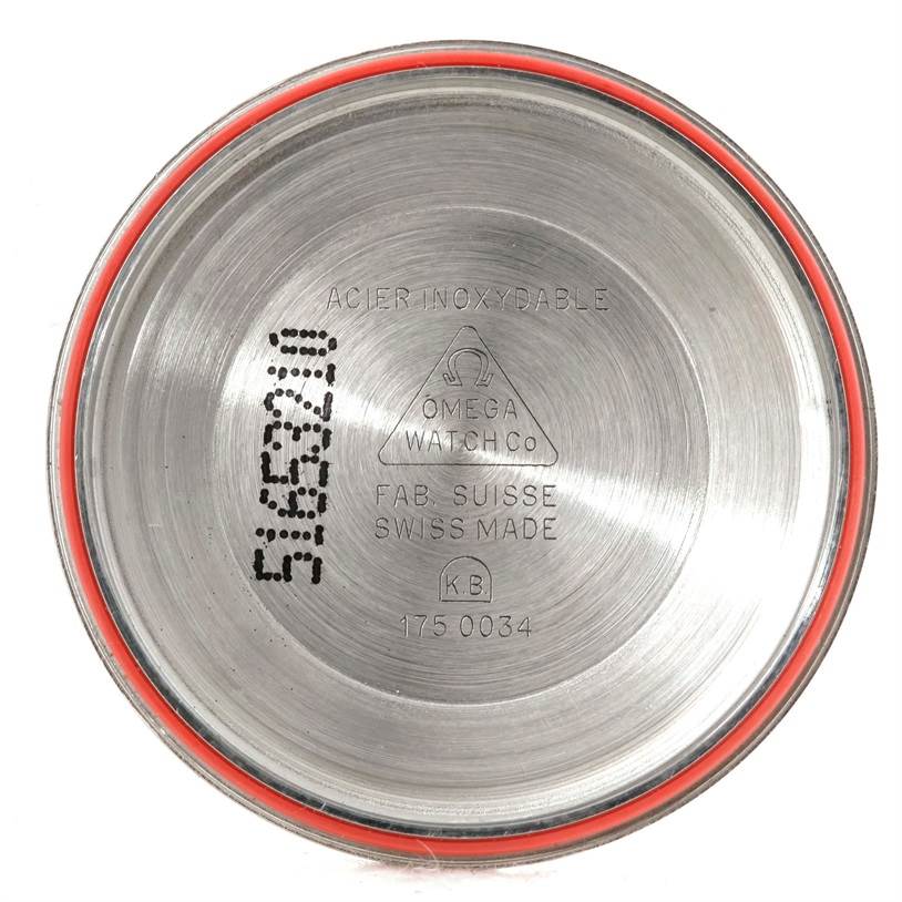 The image shows the underside of the case back for the Omega Speedmaster 3330.20.00 Men
s Stainless Steel White Dial 3330.20.00 Men
s Stainless Steel White Dial watch.