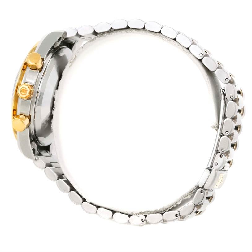 The image shows the side view of an Omega Speedmaster 3330.20.00 Men
s Stainless Steel White Dial 3330.20.00 Men
s Stainless Steel White Dial watch, highlighting the crown, pushers, and metal bracelet.