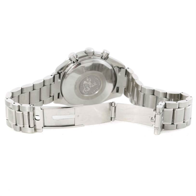 The image shows the back and partially open clasp of an Omega Speedmaster 3520.50.00 Men
s Stainless Steel Black Dial 3520.50.00 Men
s Stainless Steel Black Dial watch with its stainless steel bracelet.