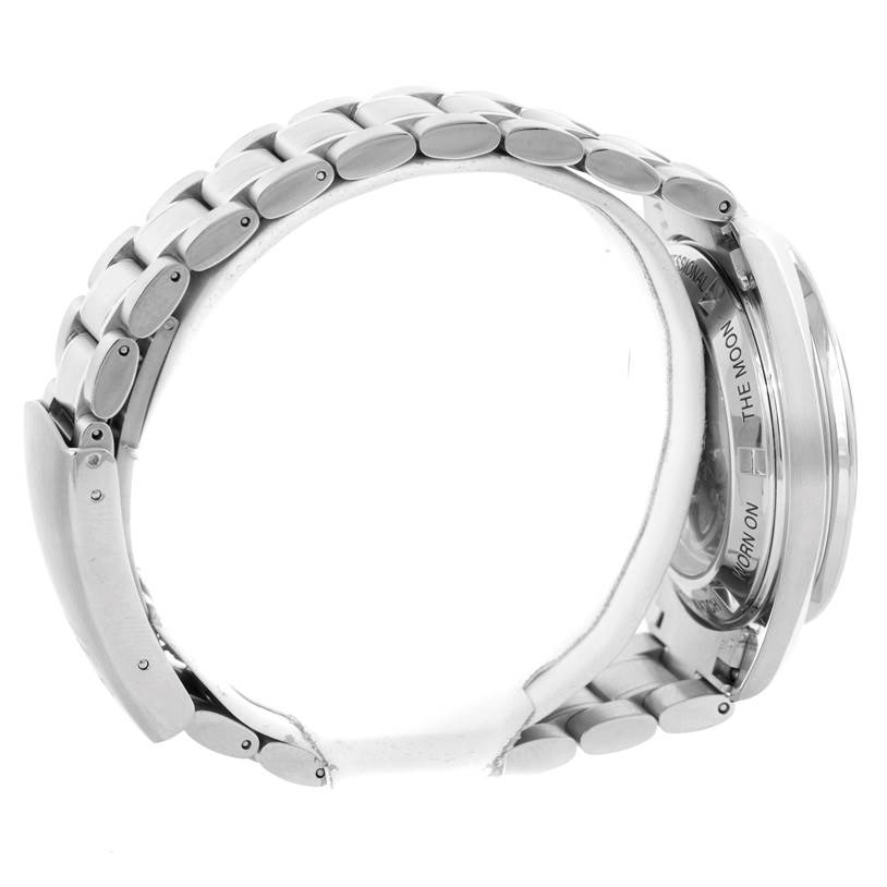 This image shows a side view of the Omega Speedmaster 3572.50.00 Men
s Stainless Steel Black Dial 3572.50.00 Men
s Stainless Steel Black Dial watch, highlighting its stainless steel bracelet and partially visible case back.