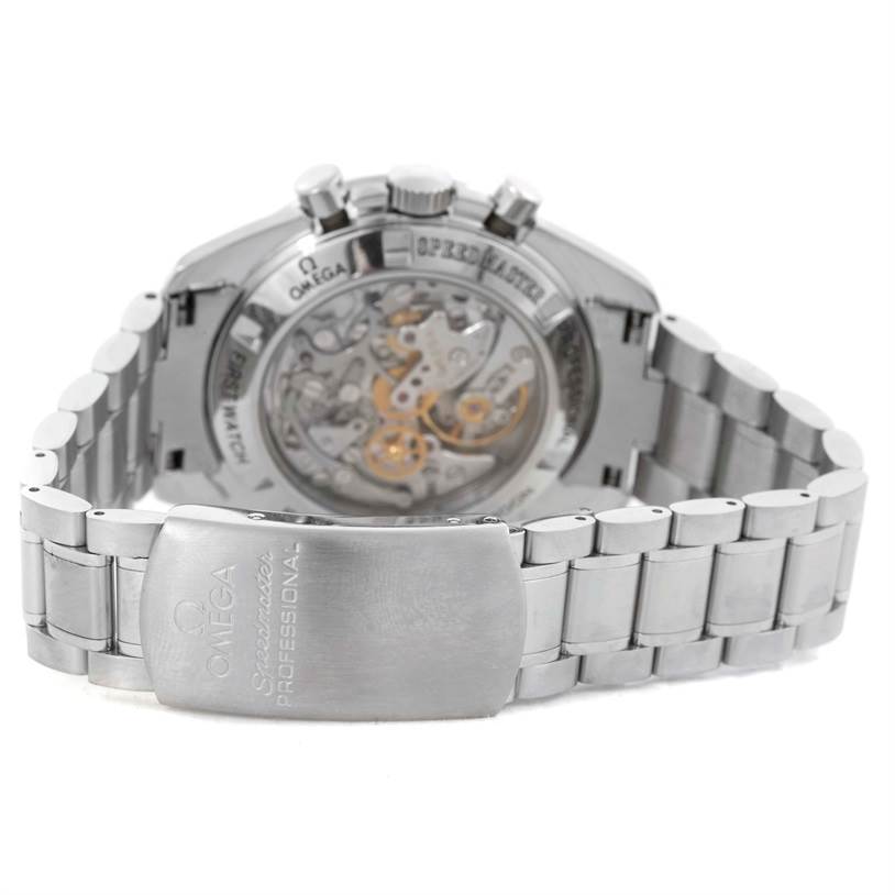 The image shows the back view of an Omega Speedmaster 3572.50.00 Men
s Stainless Steel Black Dial 3572.50.00 Men
s Stainless Steel Black Dial watch, highlighting the transparent case back and metal bracelet.