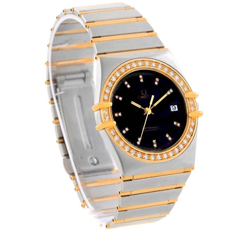 The Omega Constellation Men's Steel and Gold (two tone) Black Dial Men's Steel and Gold (two tone) Black Dial watch is shown from a front angle, highlighting its bezel, dial, date window, and bracelet.