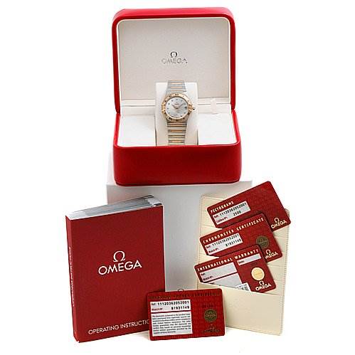 The image shows an Omega Constellation 11120362052001 OR 111.   20.   36.   20.   52.   001 Rose Gold Silver Dial 11120362052001 OR 111.   20.   36.   20.   52.   001 Rose Gold Silver Dial watch in its box, along with cards, booklets, and operating instructions.