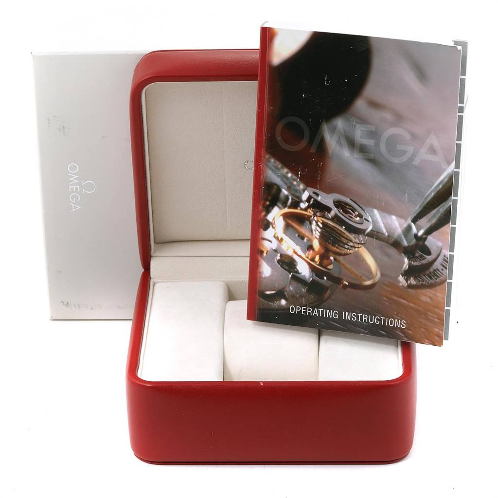 The image shows the Omega Constellation 1211.10.00 Men's Steel and Gold (two tone) Champagne Dial 1211.10.00 Men's Steel and Gold (two tone) Champagne Dial watch's red box and operating instructions booklet.