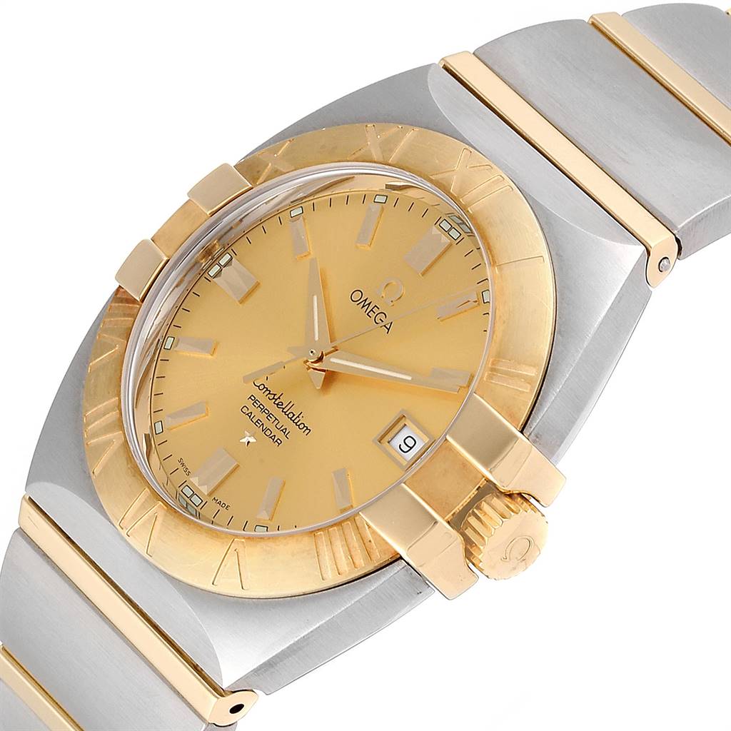 This image shows a close-up, angled view of the Omega Constellation 1211.10.00 Men's Steel and Gold (two tone) Champagne Dial 1211.10.00 Men's Steel and Gold (two tone) Champagne Dial watch, highlighting the gold dial, bezel, and part of the bracelet.
