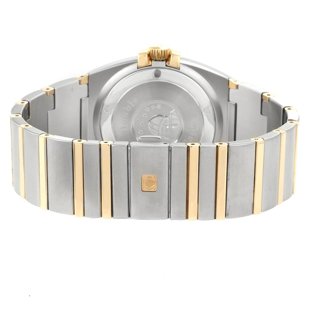 The image shows the back of an Omega Constellation 1211.10.00 Men's Steel and Gold (two tone) Champagne Dial 1211.10.00 Men's Steel and Gold (two tone) Champagne Dial watch, displaying its stainless steel and gold bracelet.