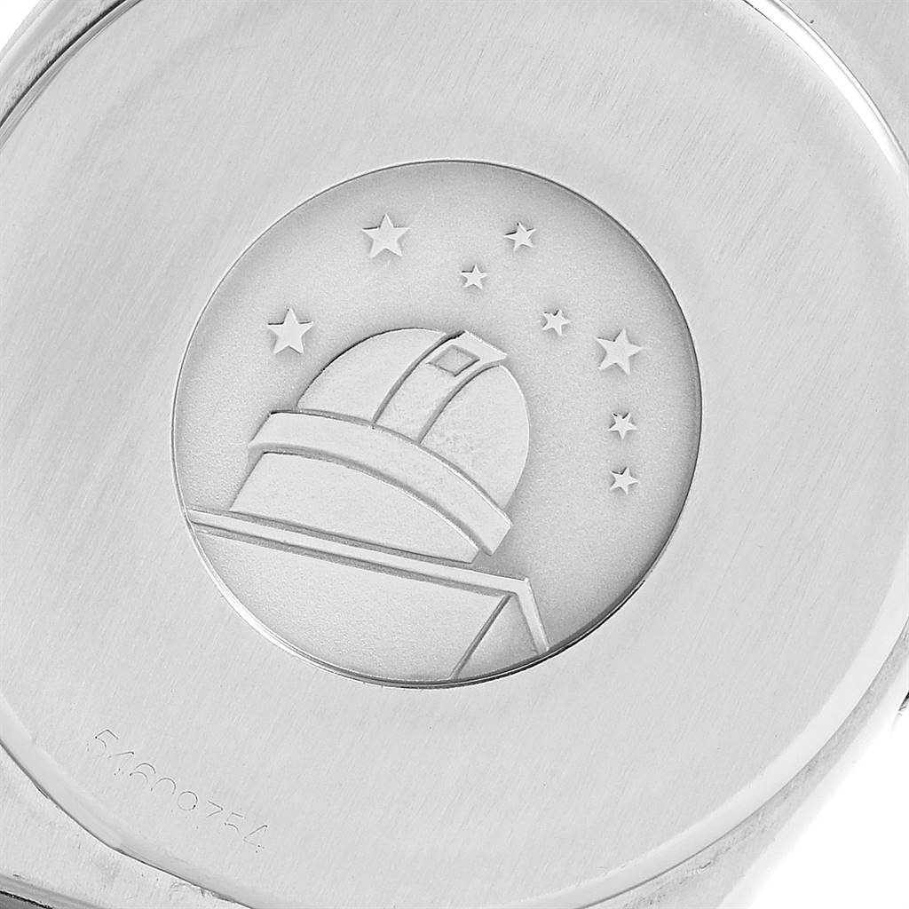 The image shows the case back of an Omega Constellation 396.1076 Men's Steel and Gold (two tone) White Dial 396.1076 Men's Steel and Gold (two tone) White Dial watch with an engraved observatory emblem.