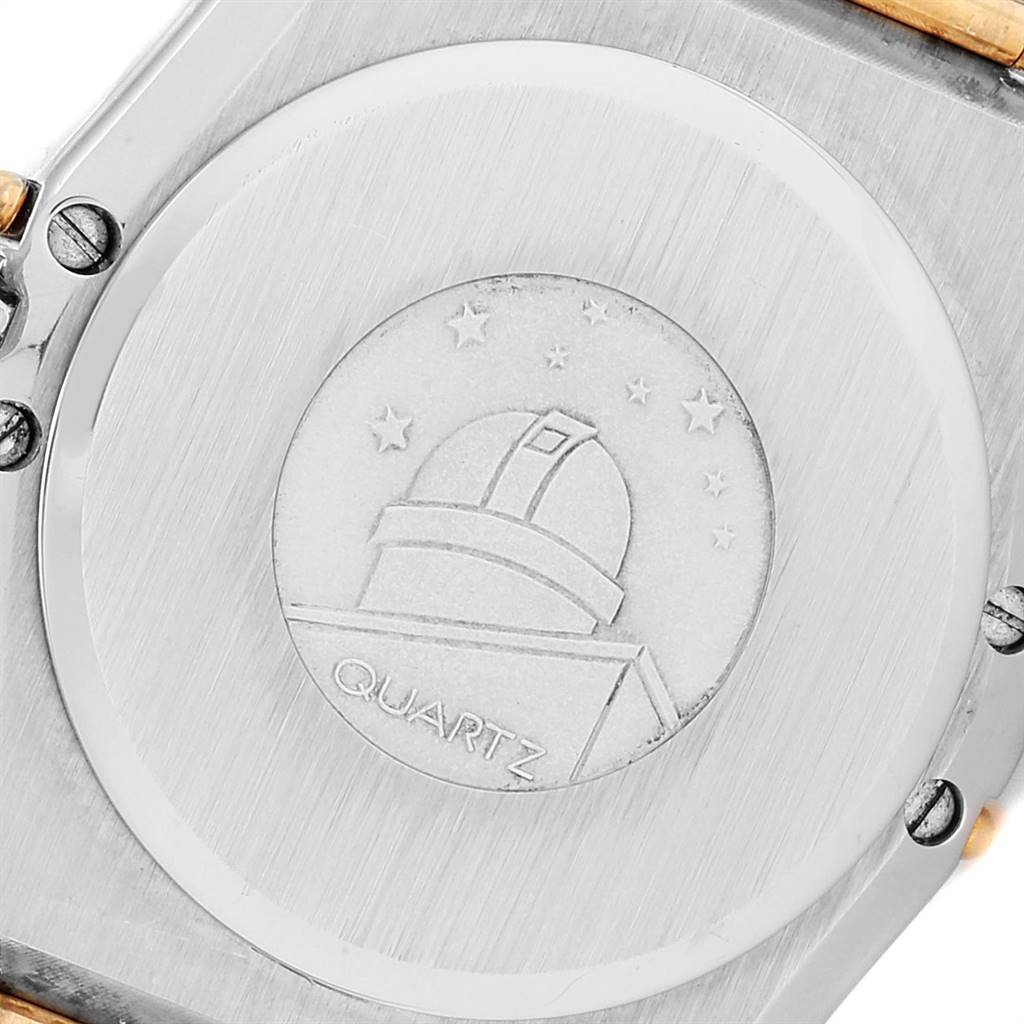 This image shows the case back of an Omega Constellation  Men's Steel and Gold (two tone) Black Dial  Men's Steel and Gold (two tone) Black Dial Quartz watch.