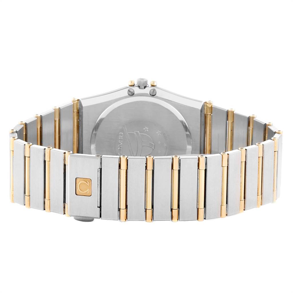 The image shows the back and bracelet of an Omega Constellation  Men's Steel and Gold (two tone) Black Dial  Men's Steel and Gold (two tone) Black Dial watch, featuring a combination of metal links.