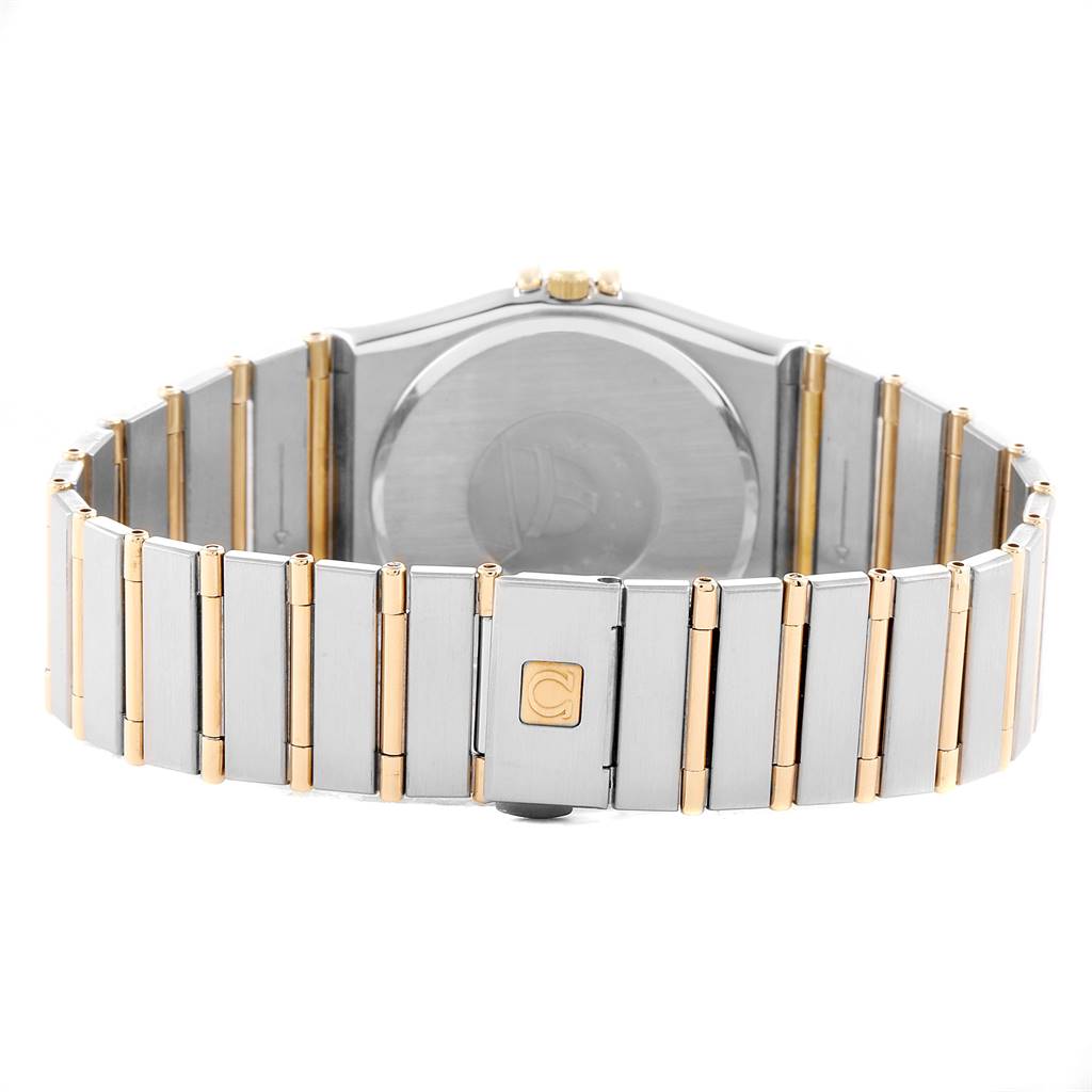 The image shows the back side and bracelet of an Omega Constellation 396.1076 Men
s Steel and Gold (two tone) White Dial 396.1076 Men
s Steel and Gold (two tone) White Dial watch, highlighting the two-tone metal and clasp.