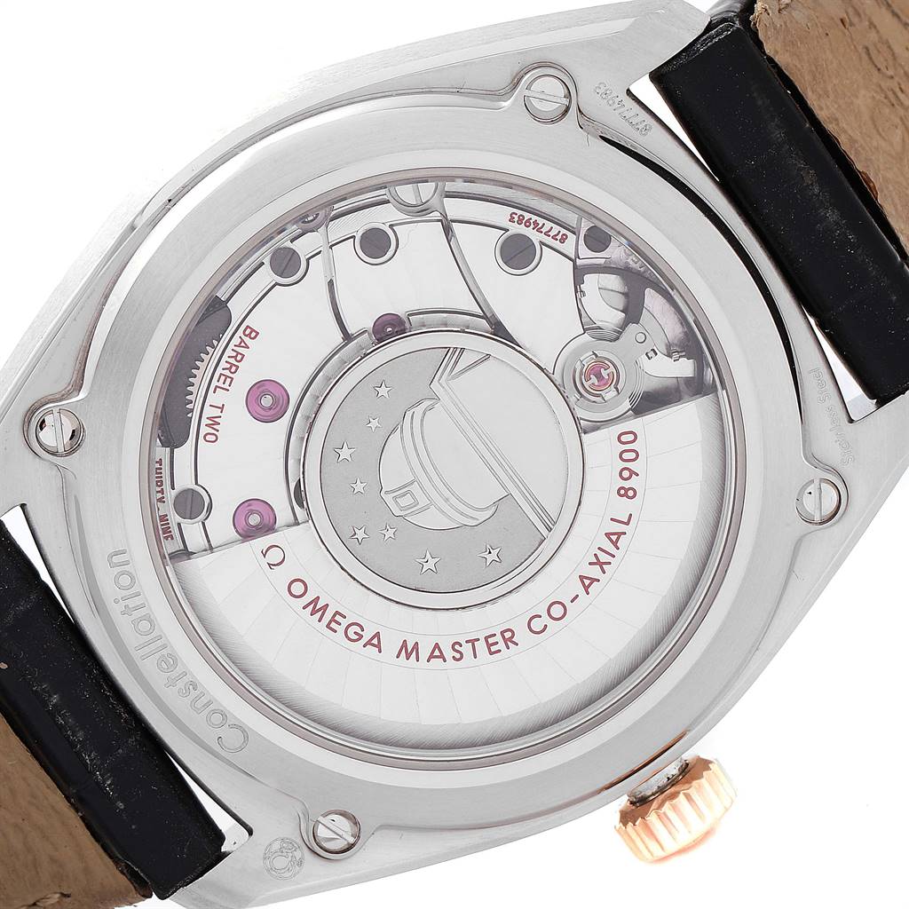 This image shows the back of the Omega Constellation 130.23.39.21.03.001 Men's Steel and Gold (two tone) Blue Dial 130.23.39.21.03.001 Men's Steel and Gold (two tone) Blue Dial watch, revealing the Co-Axial 8900 movement and intricate internals.