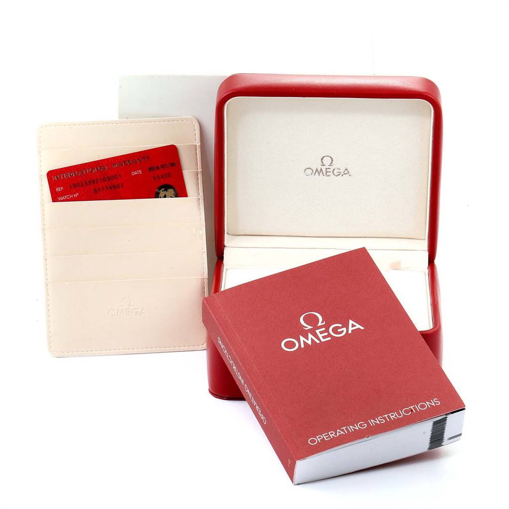 The image shows an open Omega Constellation 130.23.39.21.03.001 Men's Steel and Gold (two tone) Blue Dial 130.23.39.21.03.001 Men's Steel and Gold (two tone) Blue Dial watch box, a warranty card in a cardholder, and the operating instructions booklet.