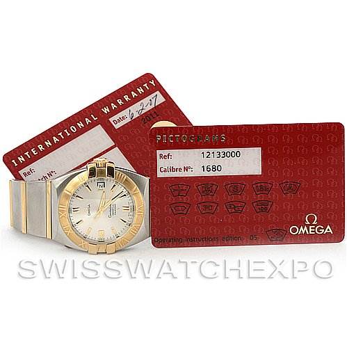 The image shows an Omega Constellation 1211.30.00 OR 12133000 Men's Steel and Gold (two tone) Silver Dial 1211.30.00 OR 12133000 Men's Steel and Gold (two tone) Silver Dial watch from a front angle, accompanied by its international warranty and pictogram cards.
