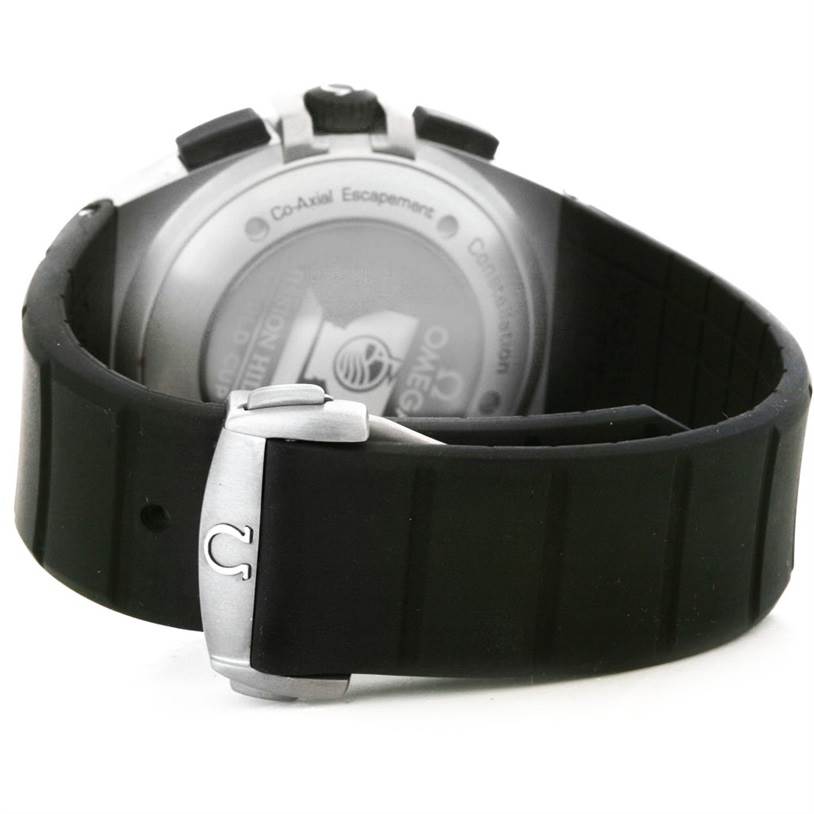 The image shows the back of an Omega Constellation 121.92.41.50.01.001 Men's Titanium Black Dial 121.92.41.50.01.001 Men's Titanium Black Dial watch, featuring its case and black rubber strap with a clasp.