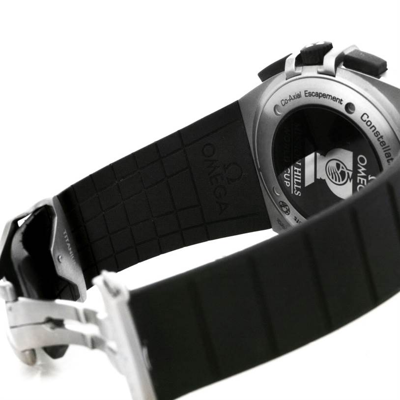 The image shows the back case and the black rubber strap of the Omega Constellation 121.92.41.50.01.001 Men's Titanium Black Dial 121.92.41.50.01.001 Men's Titanium Black Dial watch at an angle.