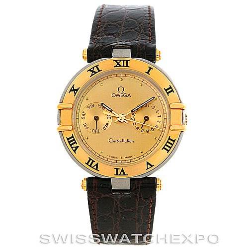 The image shows a front view of an Omega Constellation Men's Steel and Gold (two tone) Champagne Dial Men's Steel and Gold (two tone) Champagne Dial watch with a gold-tone dial, Roman numeral hour markers, and a leather strap.