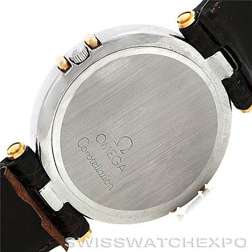 The image shows the back case and part of the leather strap of an Omega Constellation Men's Steel and Gold (two tone) Champagne Dial Men's Steel and Gold (two tone) Champagne Dial watch.