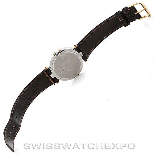 The image shows the back view of an Omega Constellation Men's Steel and Gold (two tone) Champagne Dial Men's Steel and Gold (two tone) Champagne Dial watch with a dark leather strap and a gold buckle.