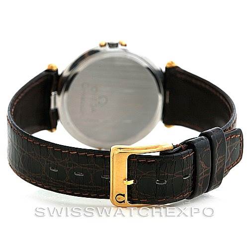 The image shows the back and buckle of an Omega Constellation Men's Steel and Gold (two tone) Champagne Dial Men's Steel and Gold (two tone) Champagne Dial watch with a black leather strap and gold clasp.